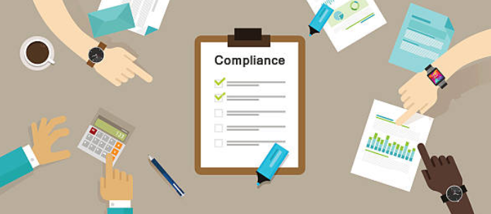 graphic image of a clipboard with the word "Compliance"